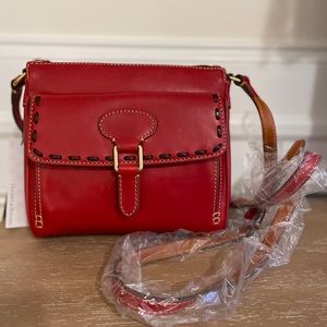 New with tags. Red Pocket Crossbody Dooney and Bourke.